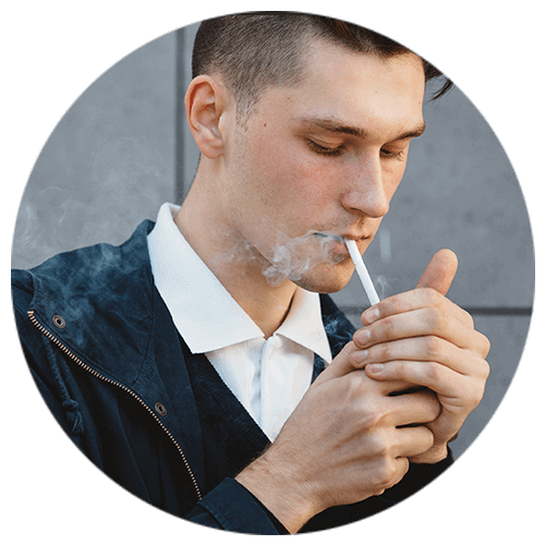 Man addicted to smoking in need of De addiction therapy from Mindsight Clinic