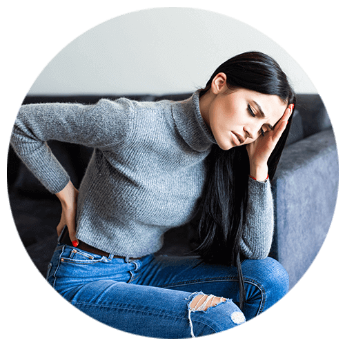 Woman with muscle pain due to anger management issues.